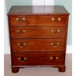 A George III oak chest of drawers, fitted with four long graduated drawers, raised on bracket feet,