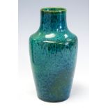 A Ruskin high fired baluster vase, circa 1920's, mottled emerald green glaze, impressed 'Ruskin',