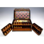 A late Victorian/Edwardian mahogany games compendium,