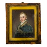 A mid 19th Century portrait miniature on ivory, a young gentleman, half length,