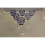 A set of six St Louis blue flashed glass hock glasses, facet cut stems,