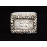 A George III silver vinaigrette, Birmingham 1819, engraved 'J Kelly', gilt lined interior,