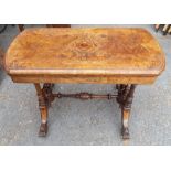 A mid Victorian walnut and marquetry inlaid fold-over card table, circa 1870,