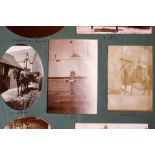 Three albums of late-19th and early-20th century photographs,