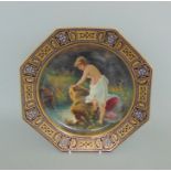 A Vienna Cabinet Plate, painted with a classical maiden about to bathe in a stream,