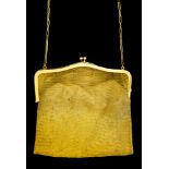 A 15ct gold mounted chainmail evening bag, on a 15ct gold chain, London import mark 1913,