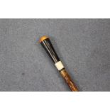 Ian Taylor, a hand crafted walking stick with a yew wood cap, ox horn handle on a dog rose shaft,