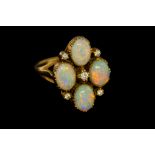 An opal four stone and diamond set cluster yellow gold ring,