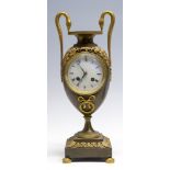 A 19th Century French bronze bracket clock, circa 1870, gilt metal mounts, swan head handles,