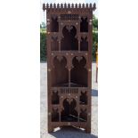 A late 19th Century chip carved corner unit, in the Moorish design, inlaid throughout,