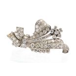 An early 20th century diamond and platinum stylised spray brooch,