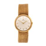 Omega, a circa 1960's 9ct gold Omega wristwatch, 3cm silvered dial with baton hands and numerals,