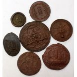 A collection of seven wax seals / roundels, armorial/heraldic shields and crests,