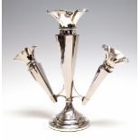 A George V silver epergne, trumpet shaped central vase stem flanked by two matching vases,
