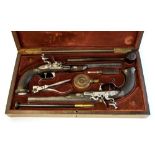 A pair of cased French made Flintlock pistols by Peniet of Paris,