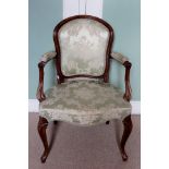 A 19th Century walnut open armchair,