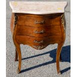 A 19th Century French Bombe walnut and kingwood veneered commode,