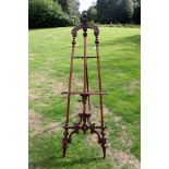 A late 19th Century mahogany picture easel with an urn finial, height adjustable,