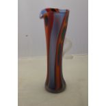 A large, multi-coloured Will 'Shaks' Shakspeare glass jug/vase with a satin finished exterior.