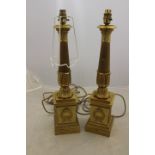 A pair of 20th Century gilt metal column table lamp bases, of neo-classical design,