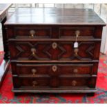 A good William III style oak geometric chest of two short and three long drawers,