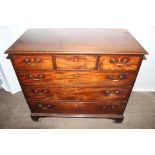 A George III mahogany chest of drawers, comprising three short over three long graduated drawers,