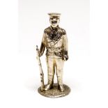 Military Interest: A George V silver model of an officer,