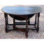 A good Charles II circa 1680 'six seat' Barley twist turned oak gate leg table of good condition,