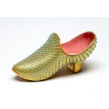 A Coalport turquoise jewelled and gilt ornamental shoe, pink interior, late 19th Century,