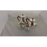 An Elizabeth II four piece silver tea and coffee service, Sheffield 1963, made by Roberts & Belk,