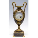 A 19th Century French bronze bracket clock, circa 1870, gilt metal mounts, swan head handles,