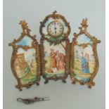 A Continental late 19th Century triptych screen with a clock fitted into the centre panel,