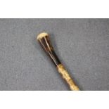 Ian Taylor, a hand crafted walking stick with a rams horn cap, horn handle and a hazel wood shaft,