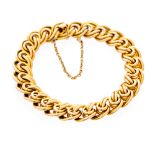 An Edwardian 15ct gold bracelet, the fancy interwoven double tubular links to tongue box snap clasp,