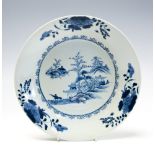 A Chinese Nanking Cargo blue and white plate, 18th Century,