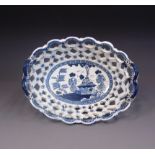 A Derby blue and white pierced oval basket, printed with an oriental scene,