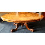 A Victorian walnut and marquetry inlaid loo table, 140cm long, 110cm wide,