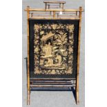 A late 19th Century Aesthetic Movement firescreen, circa 1890,