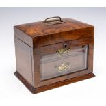 A late Victorian figured walnut jewellery casket, cica 1890, domed hinged cover with handle,