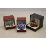 Three boxed Caithness paperweights; Myriad,