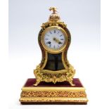 A late 19th Century French boulle work bracket clock, of Louis XV design, bird finial, 7.