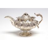 A George IV melon shaped batchelor's silver teapot,
