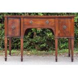 A George III mahogany bow-fronted sidebaord, the centre with a single drawer,