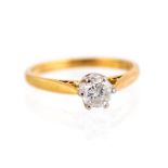 A diamond solitaire 18ct gold ring, the round brilliant cut diamond approx 0.