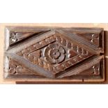 A very thick section carved oak early 17th Century rectangular panel,