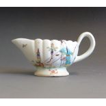 A Derby small fluted sauce boat, painted with oriental scene, circa 1765,