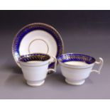 A Spode trio, tea cup, cffee cup and saucer, London shaped, cobalt blue borders and gilded,