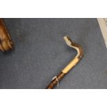 Ian Taylor, a hand crafted walking stick, the handle in the form of a gopher snake,