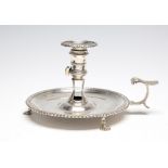 A George III silver chamberstick,