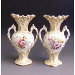 A pair of English porcelain twin handled vases,